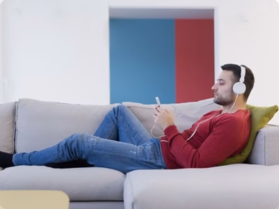 Man relaxing, listening to music